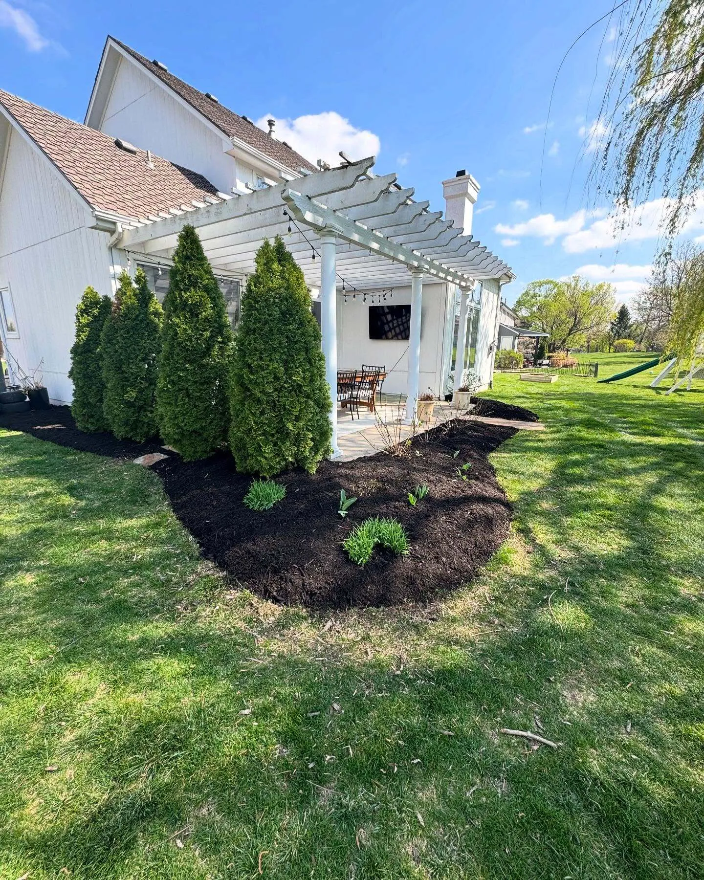 Fresh mulch bed with defined borders and clean finish