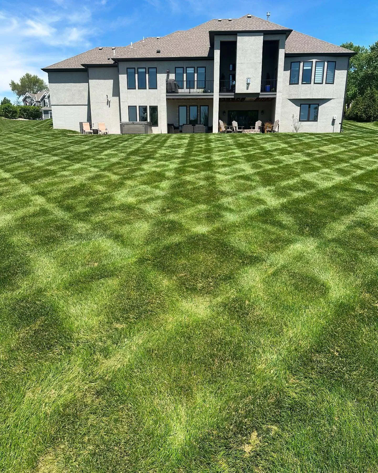 Crosshatch lawn striping pattern on large Kansas City property