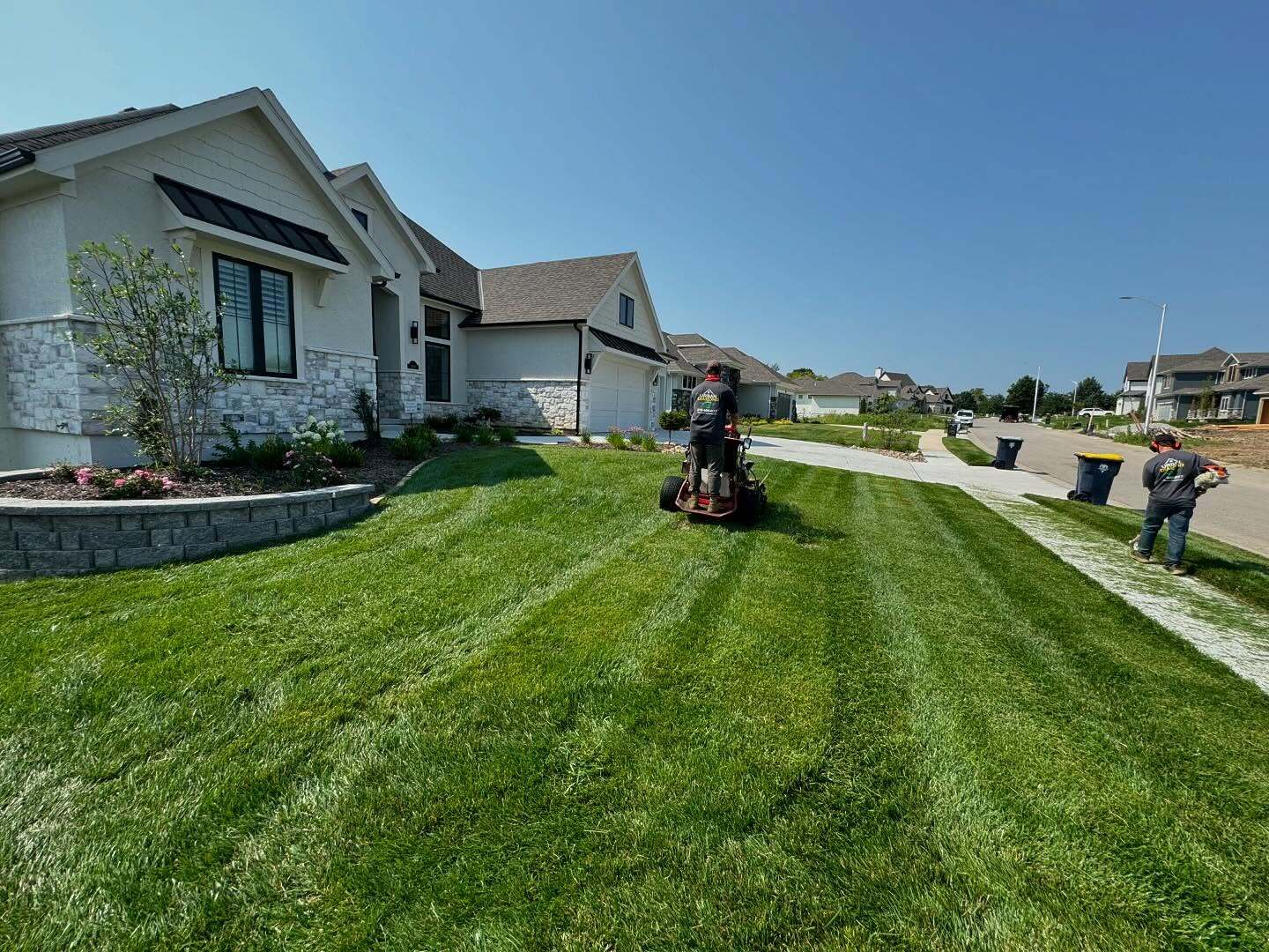 Lawn after professional mowing with diamond striping